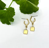 Solid square pendant on angled stud earring