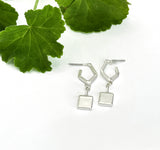 Solid square pendant on angled stud earring