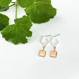Solid square pendant on angled stud earring