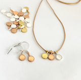 Round drop pendant on hoop stud earrings