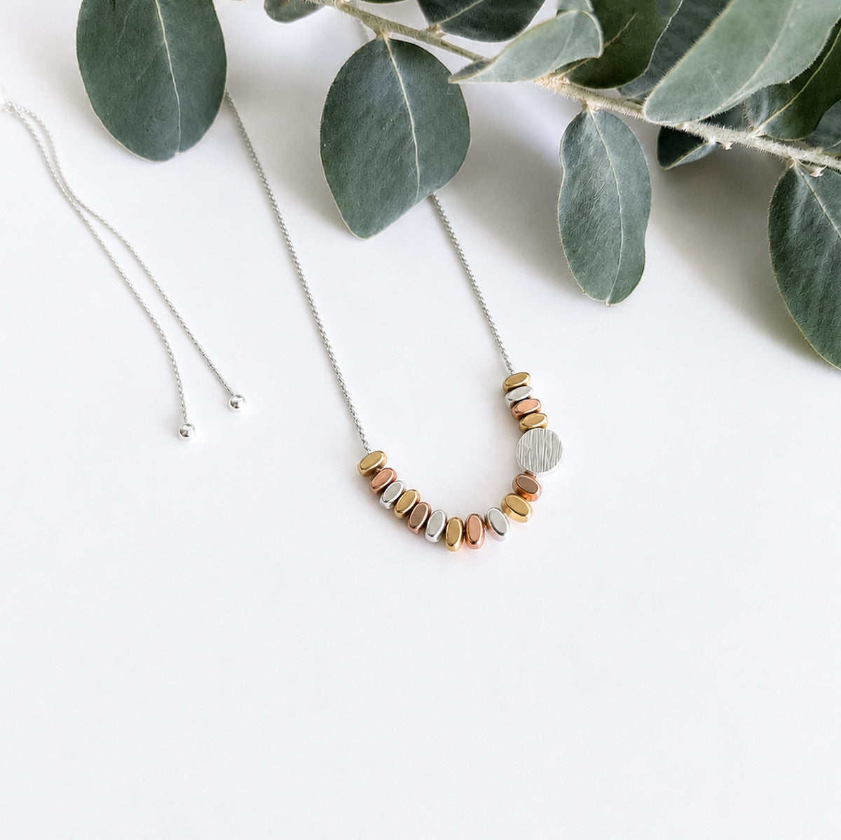 Asymmetrical Dot and Spacer Bead Necklace