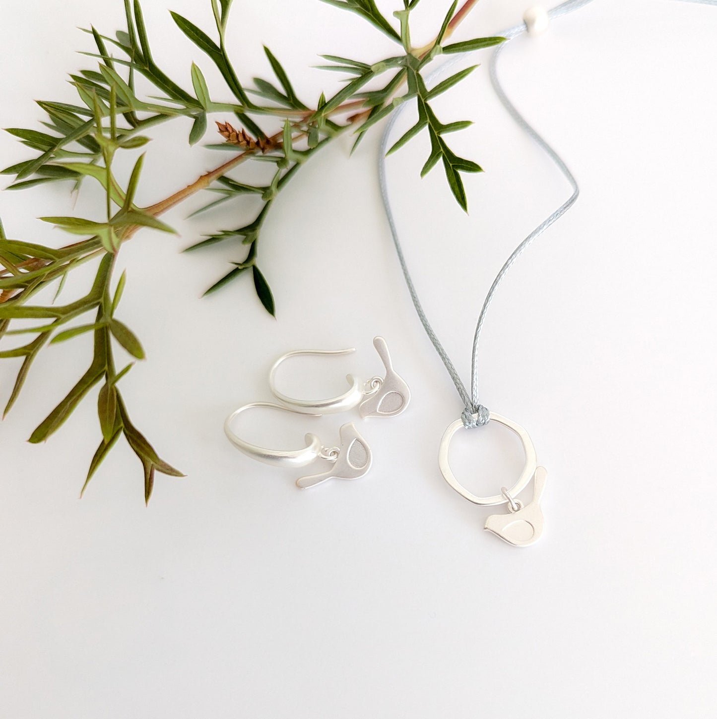 Winged bird on chunky hook earring
