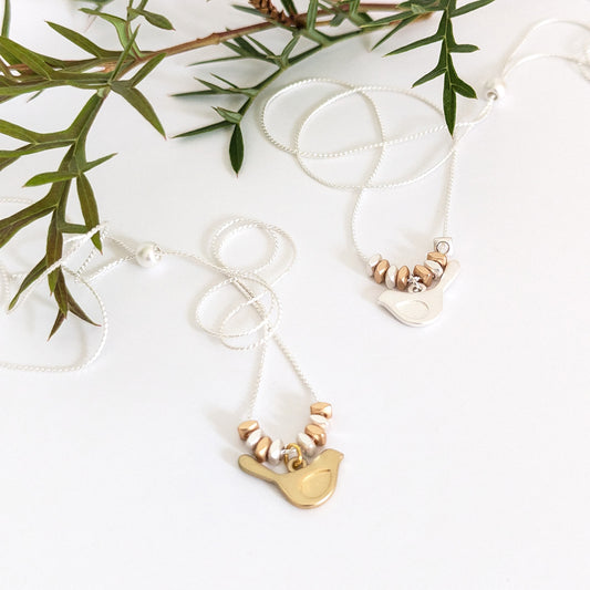 Winged bird chain necklace
