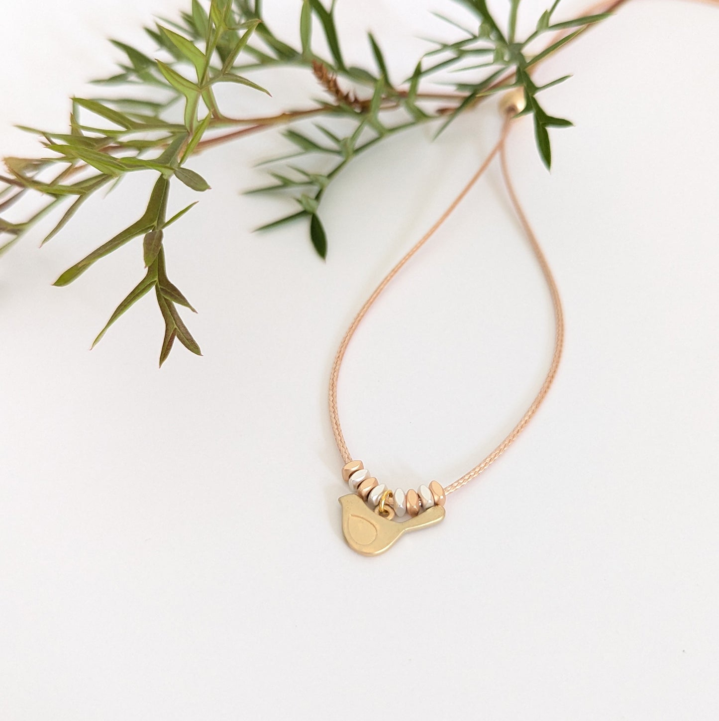 Winged Bird with spacer beads necklace