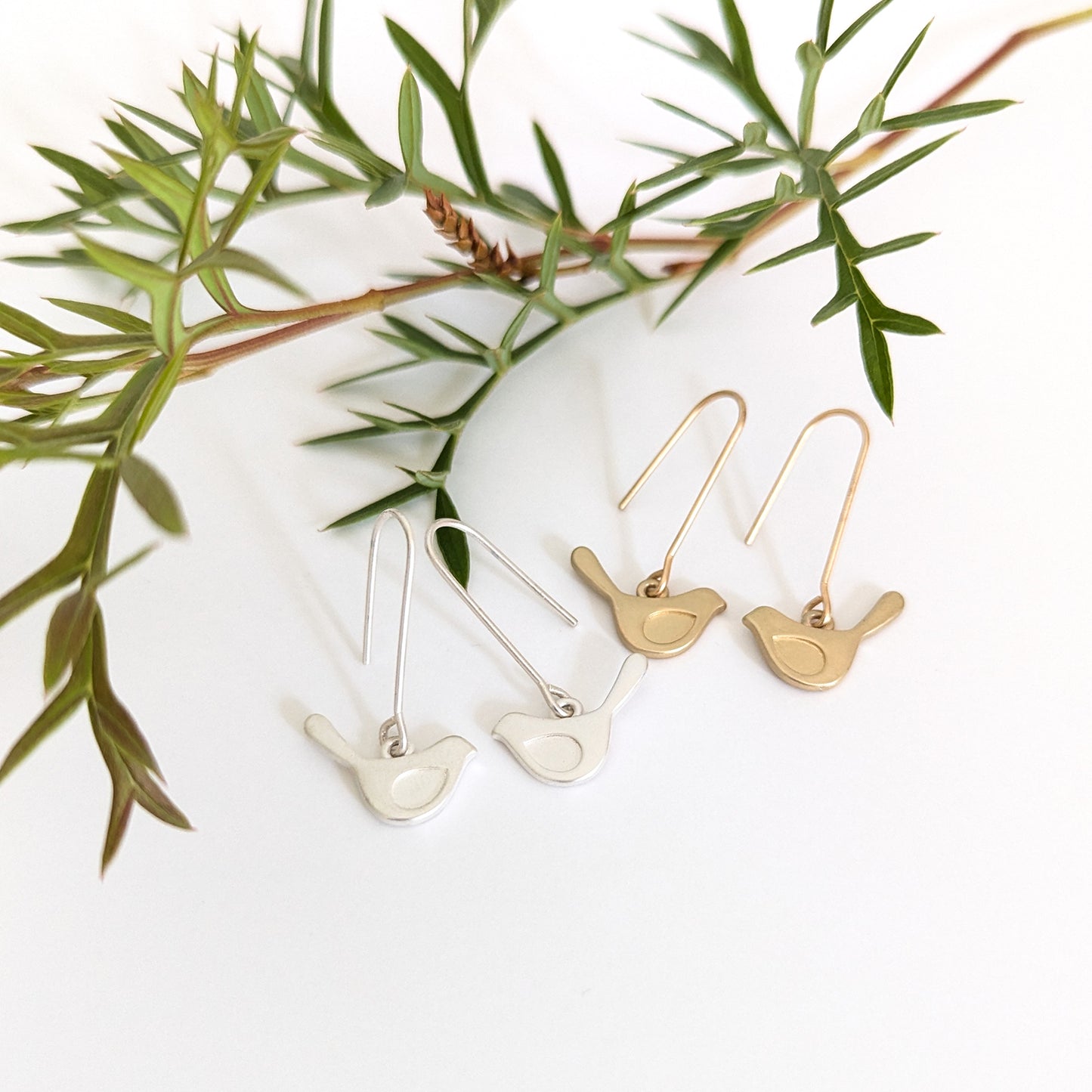 Winged bird on short straight hook earring