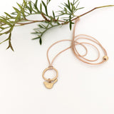 Winged bird flat ring cord necklace