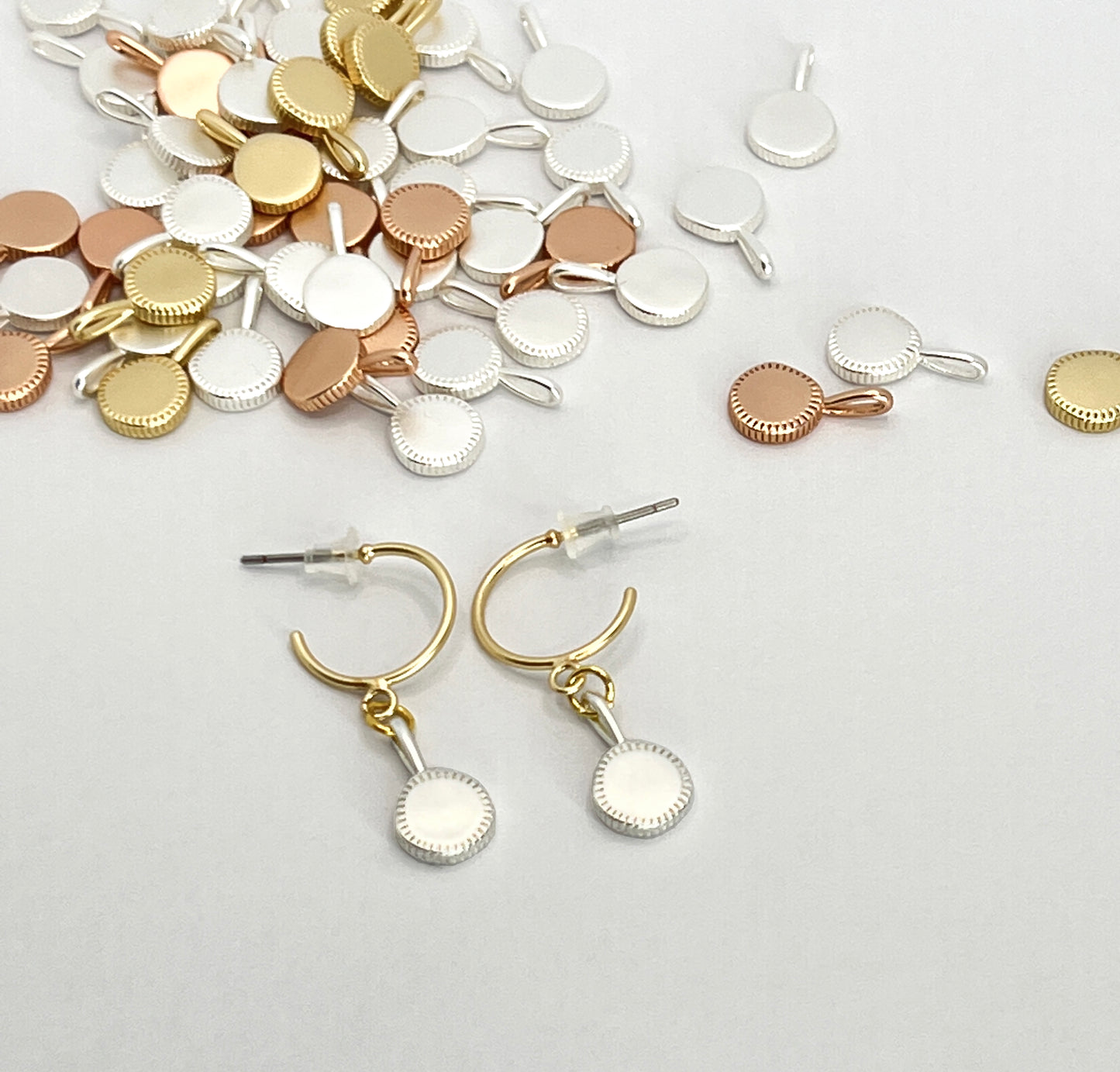 Round drop pendant on hoop stud earrings