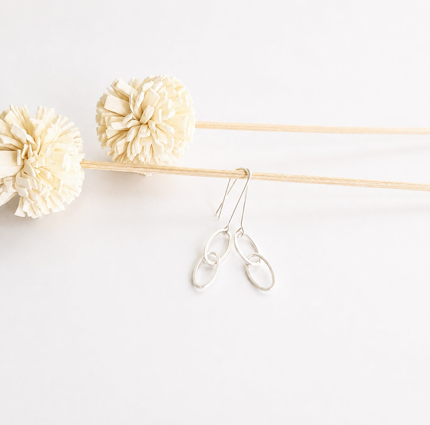 Linked oval hook earrings
