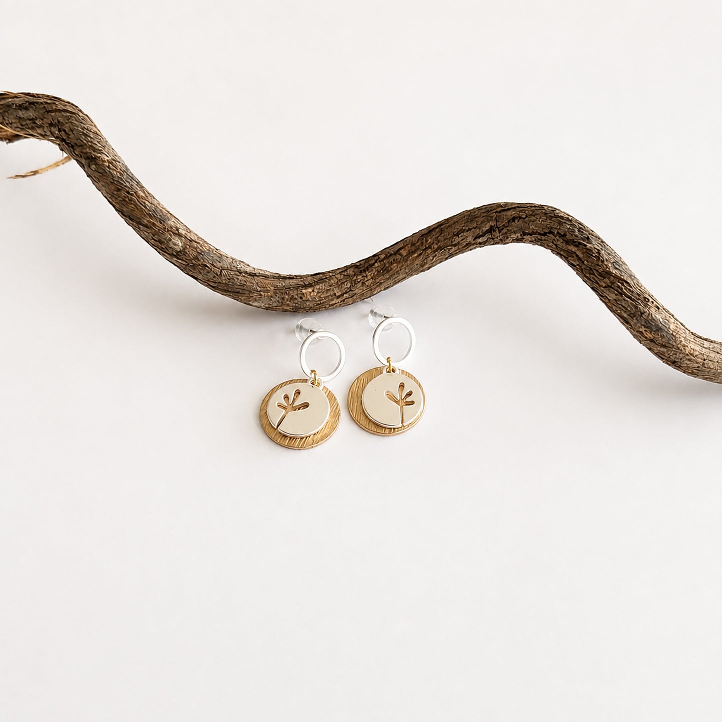 Seedling and disc stud earrings