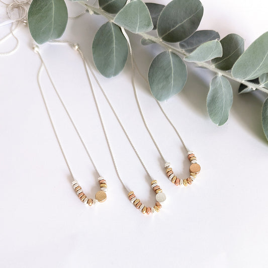 Asymmetrical Dot and Spacer Bead Necklace