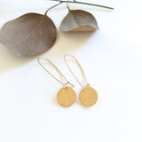 Catch back hook and textured disc earrings