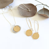 Catch back hook and textured disc earrings