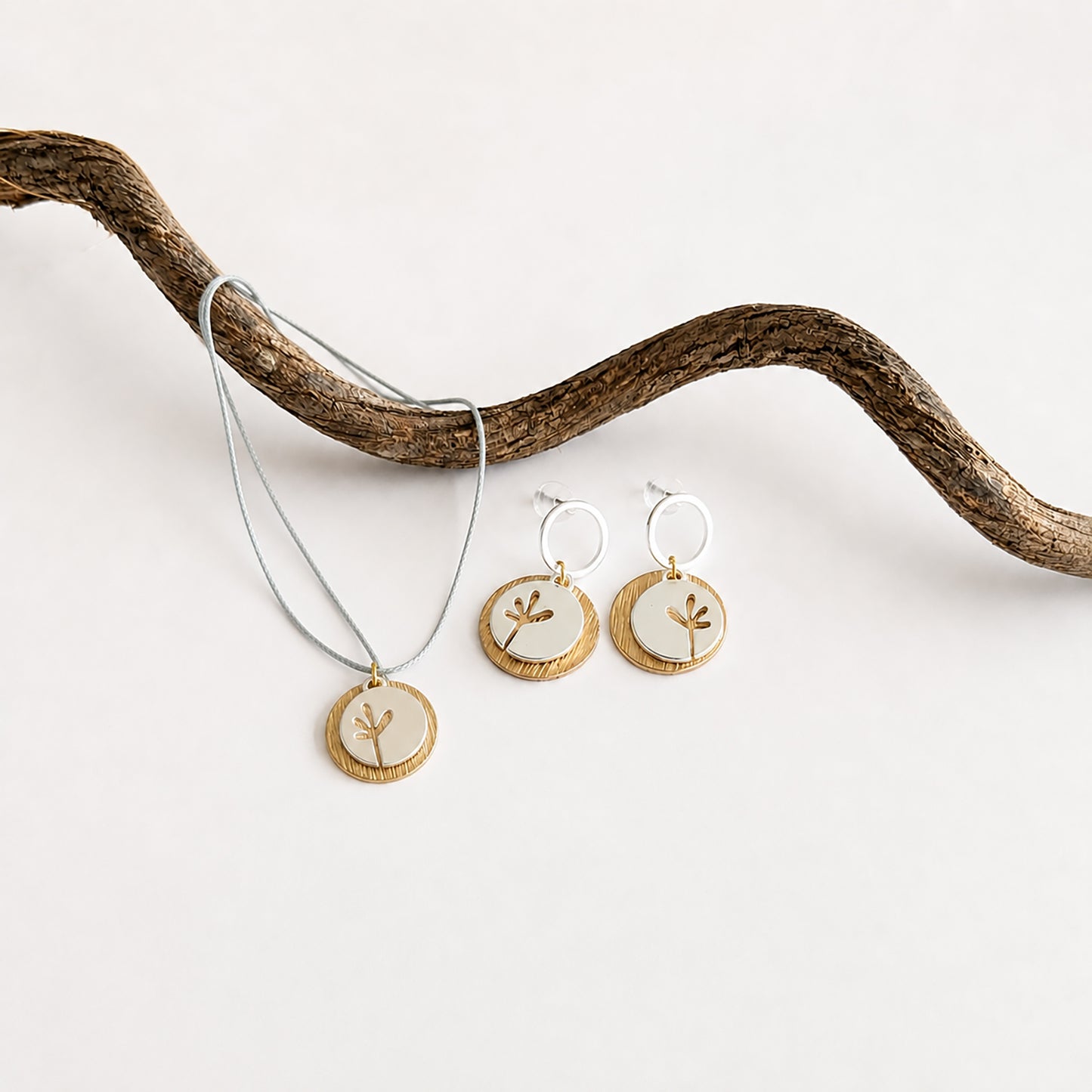 Seedling and disc stud earrings