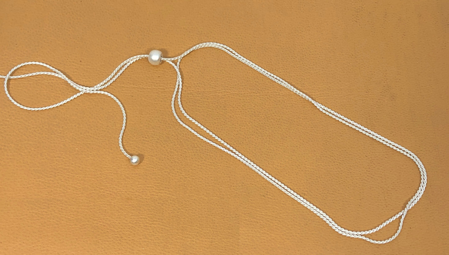 Ring and bird on silver chain necklace